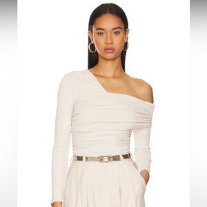 One shoulder top. NEVER WORN. NEW WITH TAGS. Susana Monaco Gathered Top.